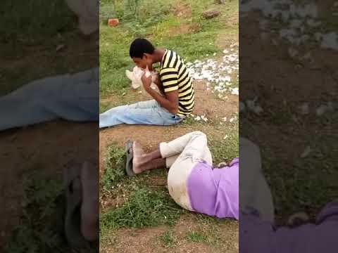 Shocking! Drunk Telangana Youth Eats Live Chicken 1 man eats live chicken