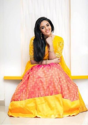 Sreemukhi in half Saree