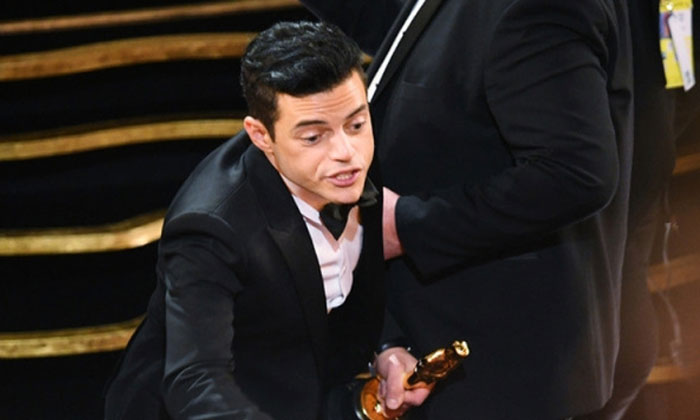 Rami Malek Falls Off Stage