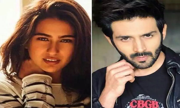 Is this Sara Ali Khan, Kartik Aryan's smooching video? 1 sara kartik aryan kissing