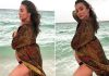 Amy Jackson flaunts baby bump at beach, viral video