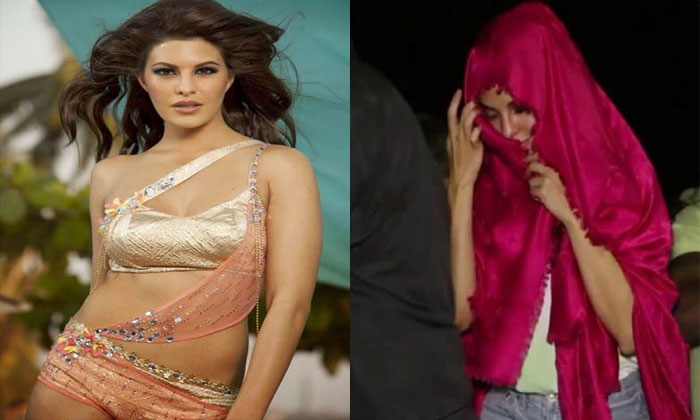 Why is actress hiding her face? 1 Jacqueline hiding face