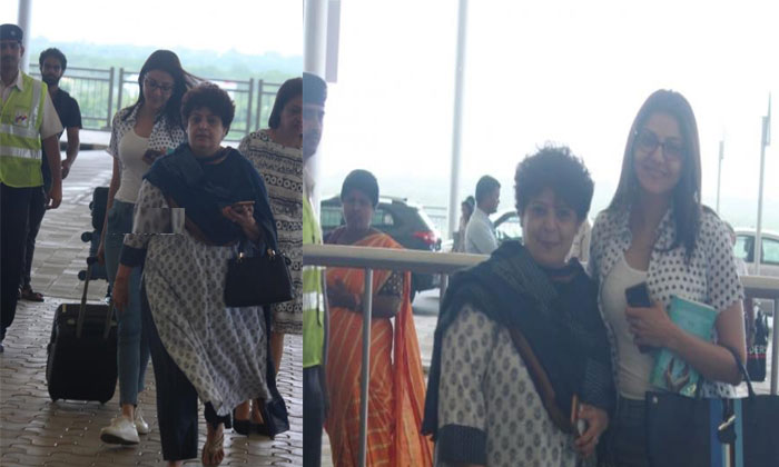 kajal aggarwal mother airport