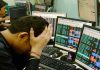 Sensex tanks over 1,450 points, Nifty below 11,000
