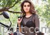 Tapsee rides a bike sans a helmet, pays a fine Taapsee ride a bike sans a helmet, pays a fine