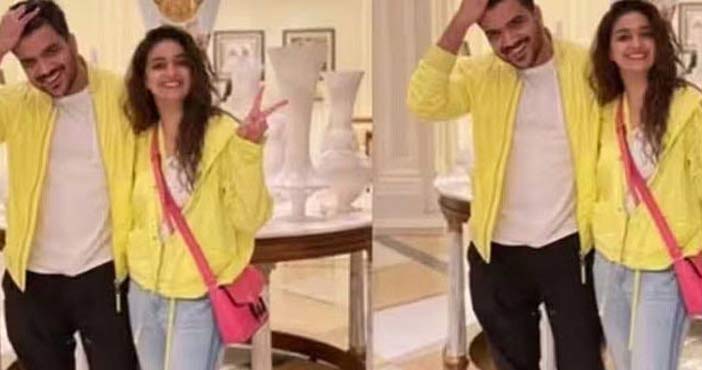 Do you know who he is with